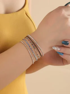 5-delige set: vergulde en verzilverd armbanden met edelstenen