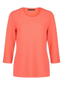 Trui koraalrood